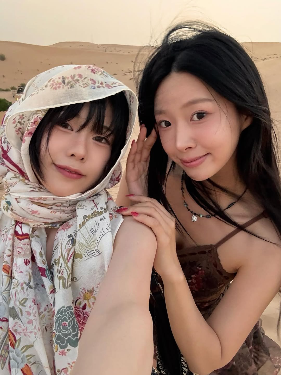 Photo shared by 고로켓 on October 31, 2025 tagging @yourhyeda. May be an image of one or more people, Bactrian camel, headscarf, outdoors and text.