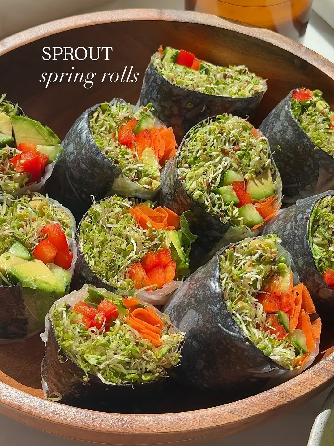 Photo shared by Danielle Brown | healthy recipes on November 03, 2025 tagging @dougevans. May be an image of sushi, smoked salmon, avocado, brussels sprouts, seaweed and text that says 'SPROUT spring rolls'.