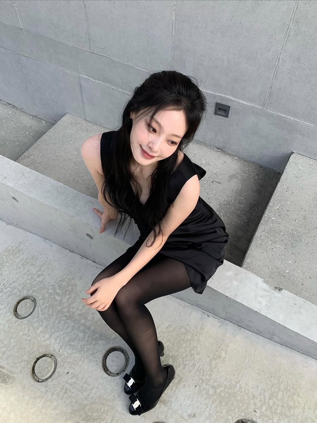 Photo shared by 최희진 on October 15, 2025 tagging @ferragamo. May be an image of fishnet stockings and text.