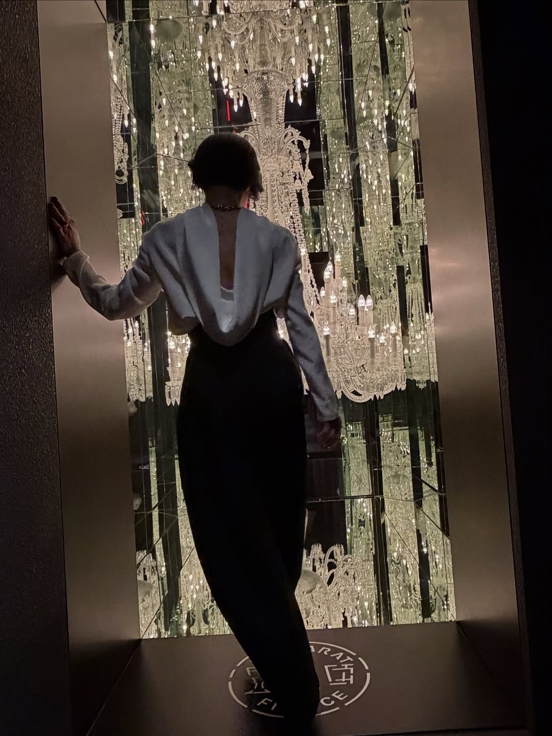 Photo shared by 강희재 on December 03, 2025 tagging @maisonalaia, @baccarat_korea, and @relaisblu_hannam. May be an image of chandelier, curtains and text.