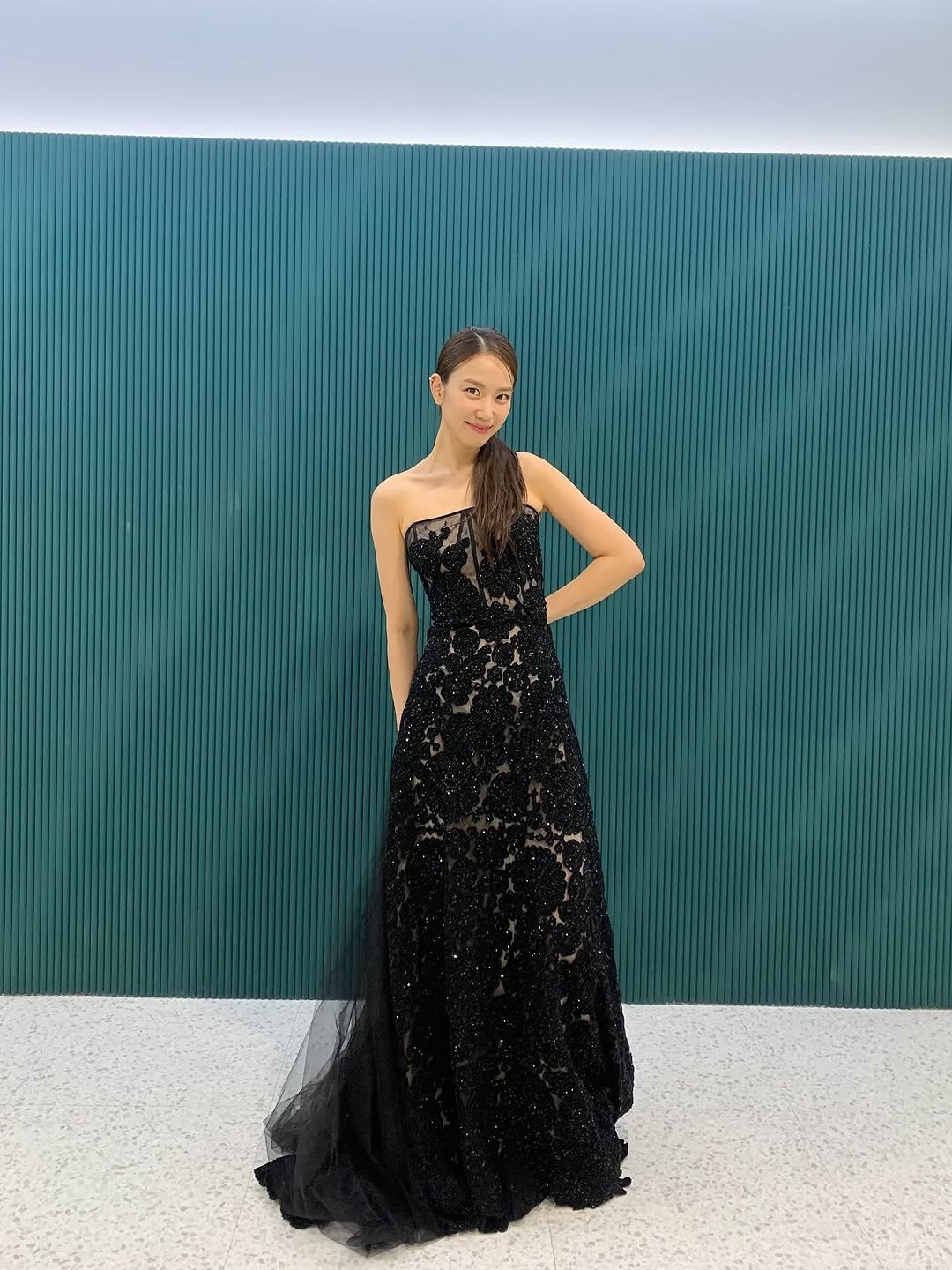 Photo by 장희령 on October 02, 2025. May be an image of 1 person, gown, dress and text.