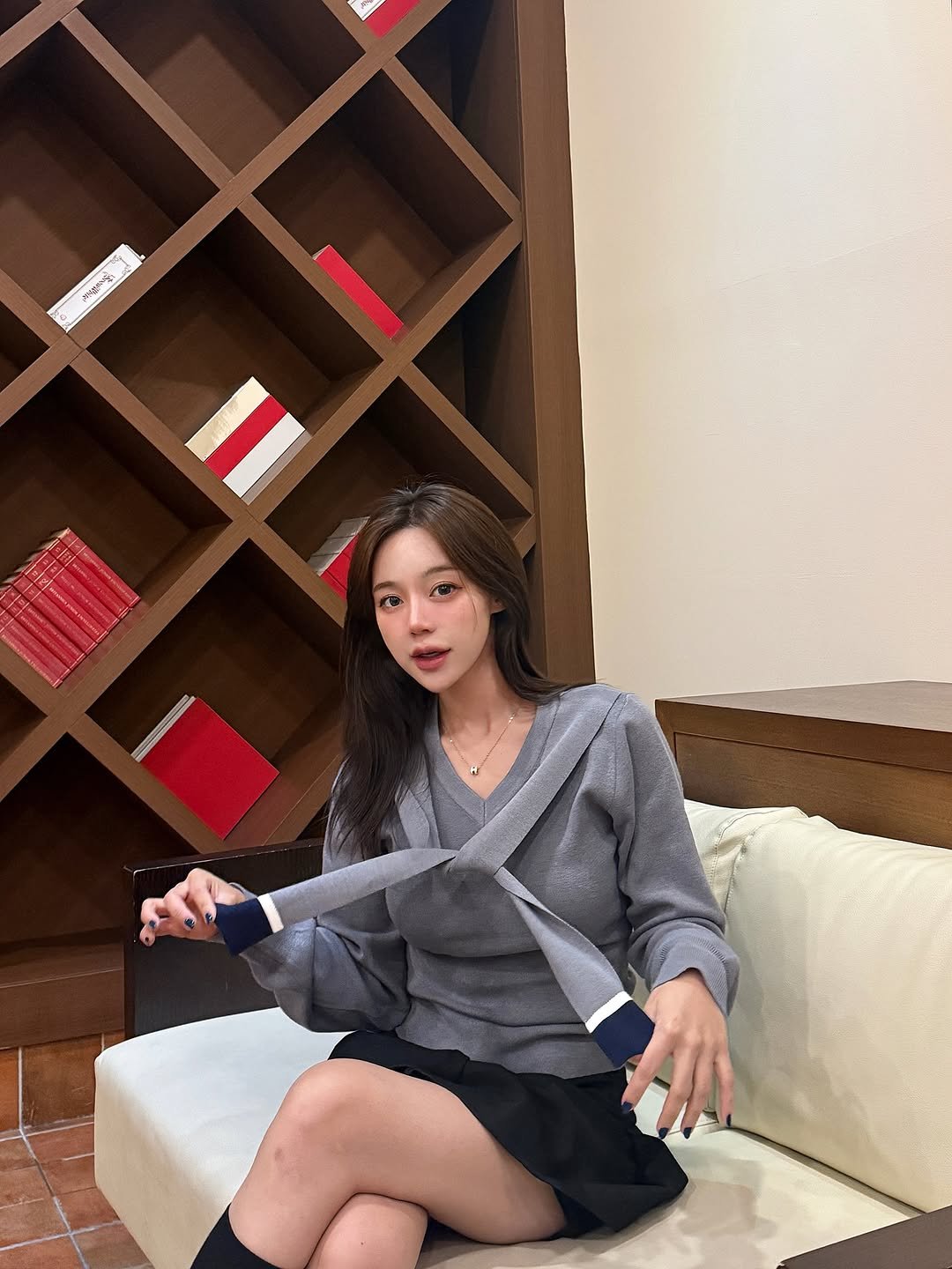 Photo shared by 정혜리 on October 30, 2025 tagging @micane_official. May be an image of dress, miniskirt and text.