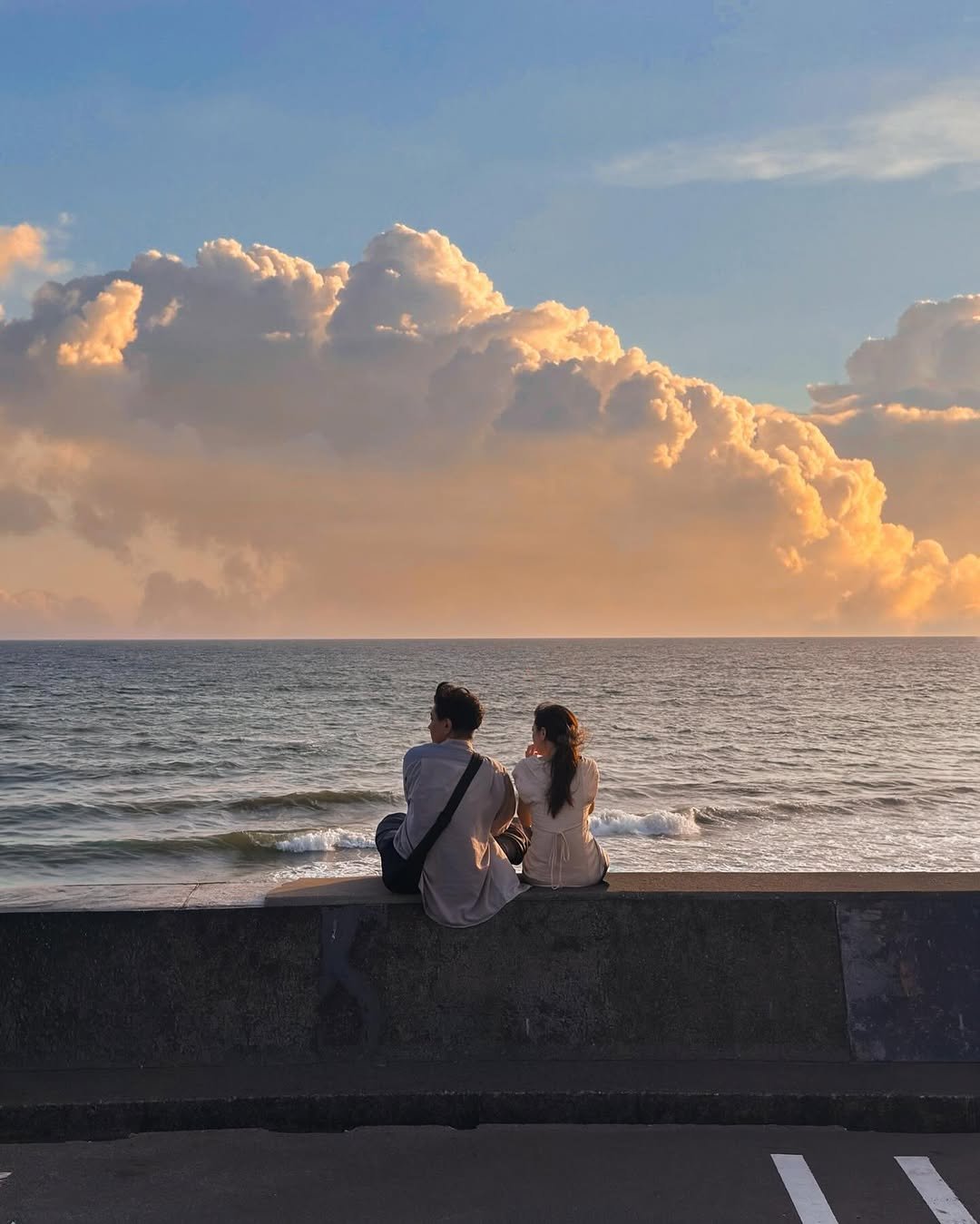 Photo by 헬로동원 hello_dongwon on December 26, 2025. May be an image of one or more people, cloud, twilight, horizon, ocean and text.
