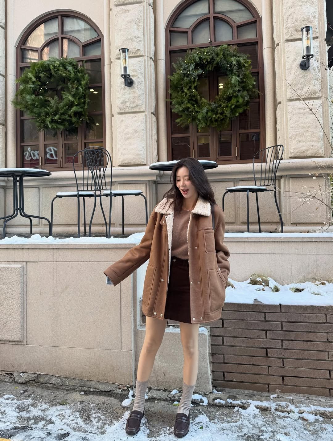 Photo shared by 이주빈 on December 05, 2025 tagging @sisleyfashion_kr. May be an image of sable coat, overcoat, parka, snow and text.