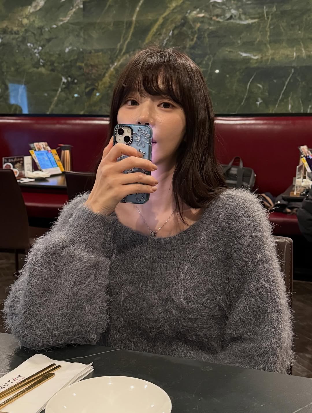 Photo by 이주빈 on January 22, 2026. May be a selfie of one or more people, hair, phone, turtleneck and text.