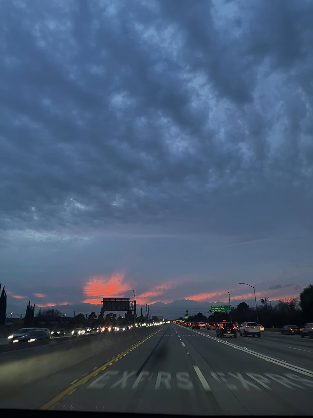 Photo by 이주빈 on February 18, 2026. May be an image of cloud, twilight, horizon, road and text.