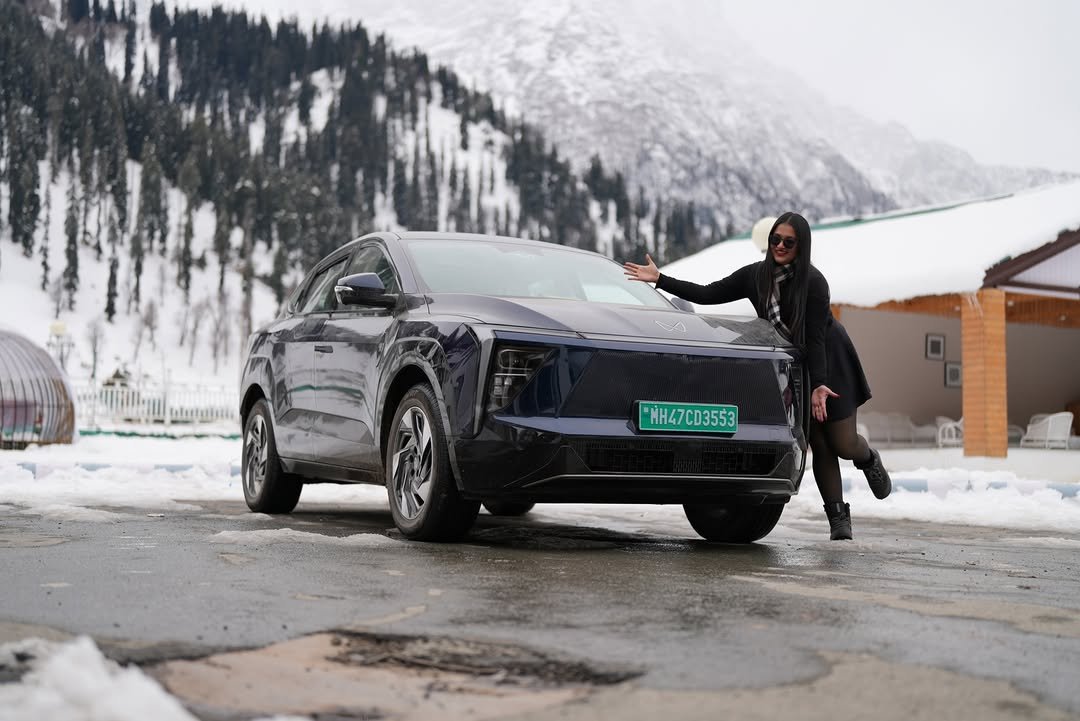 Photo shared by Mahindra Electric Origin SUVs on January 16, 2026 tagging @her_garage_yt. May be an image of sedan, road and text.