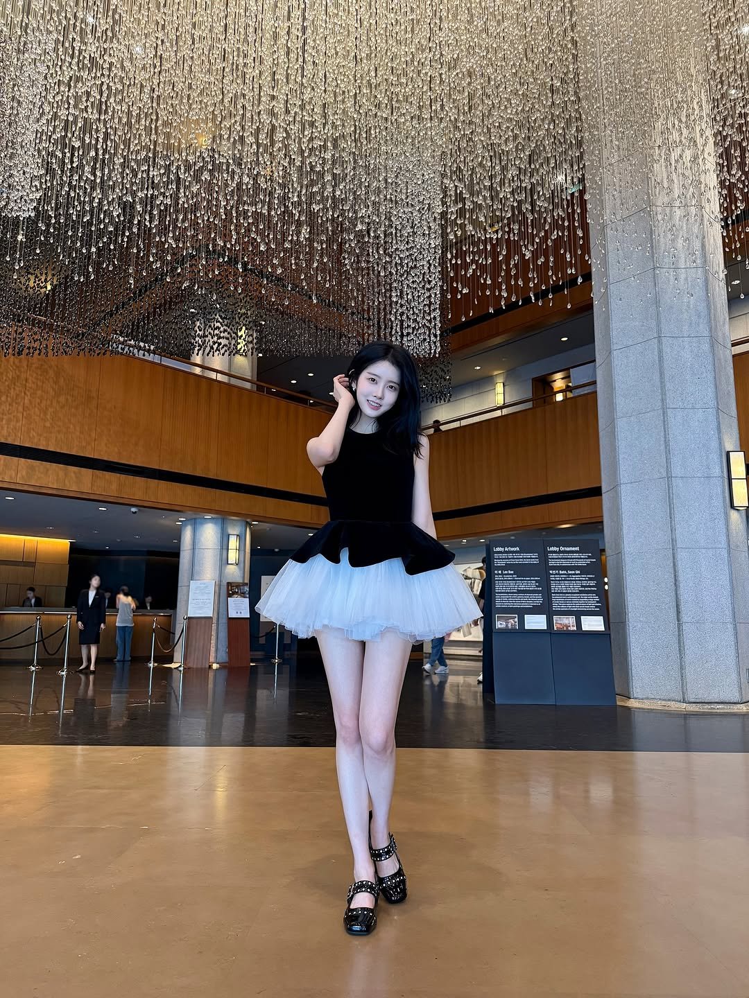 Photo by 시은 on September 11, 2025. May be an image of miniskirt, chandelier and text.