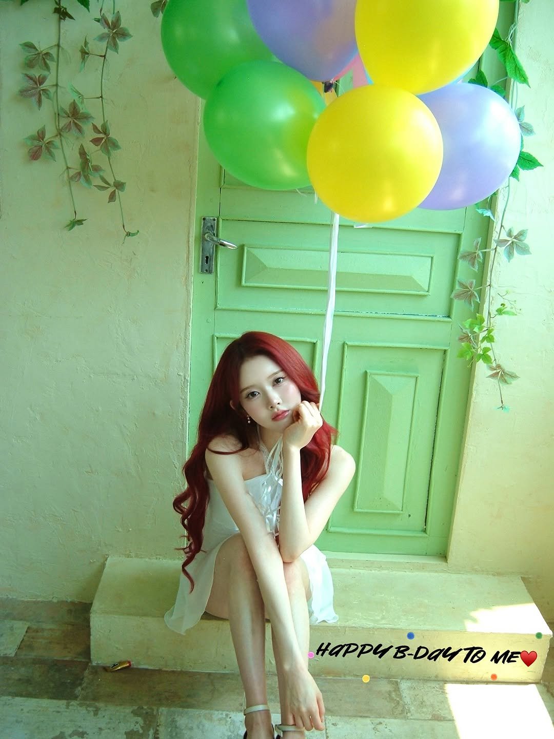 Photo by 시은 on July 31, 2025. May be an image of 1 person, hair, balloon, pie, top, dress, outdoors and text.