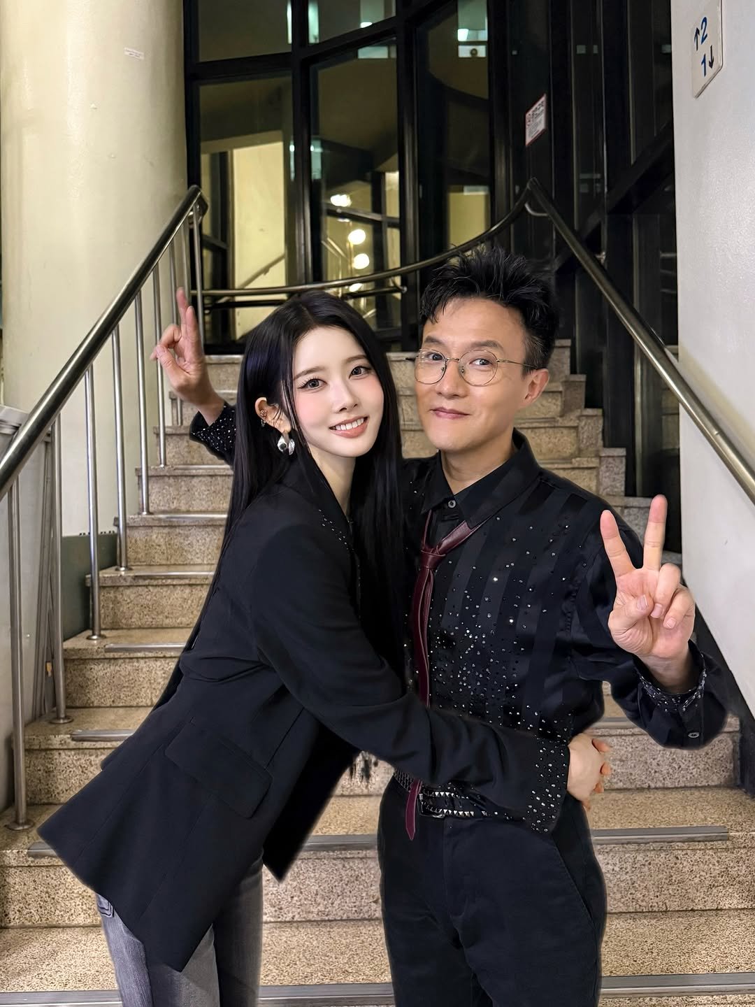 Photo by 시은 on December 13, 2025. May be an image of one or more people, hair, blazer, suit and text.