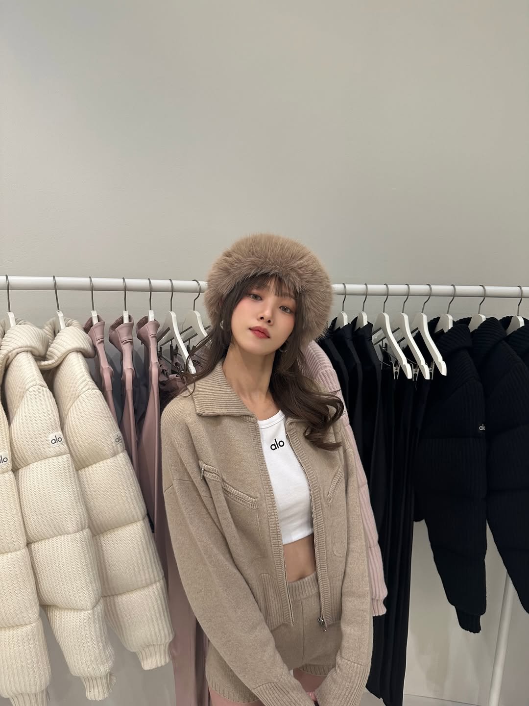 Photo shared by 이성경 on December 15, 2025 tagging @alo, and @aloseoul. May be an image of goosedown coat, sable coat, duffle coat, overcoat, jacket, parka and text.