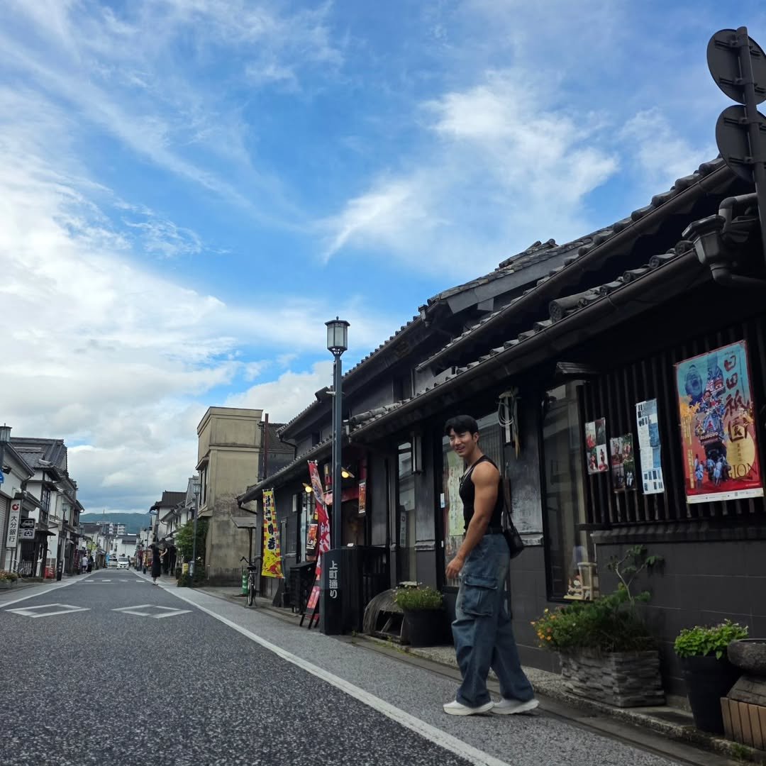 Photo by Jw on July 17, 2025. May be an image of 3 people, street, cloud and text.