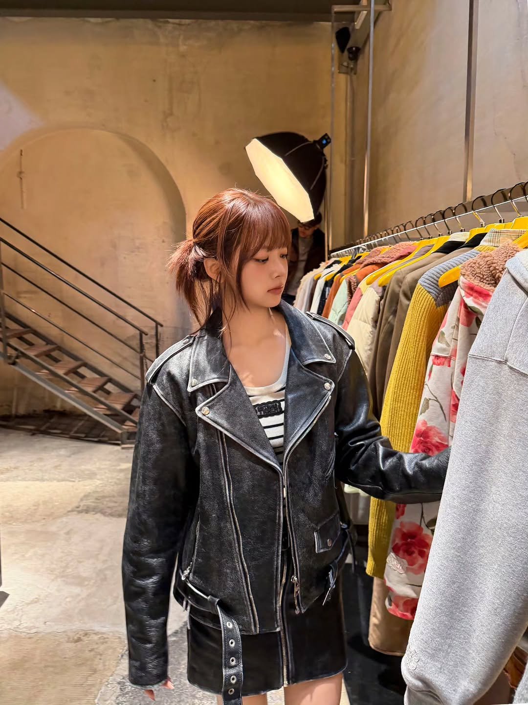 Photo shared by HONG EUNCHAE on March 02, 2026 tagging @onitsukatigerofficial, and @onitsukatigerkr. May be an image of goosedown coat, parka, jacket and text.