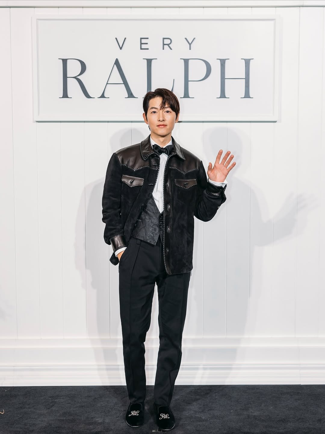 Photo shared by 송중기 songjoongki official on November 20, 2025 tagging @ralphlauren, and @poloralphlauren. May be an image of bolo tie, dinner jacket and text that says 'VERY RALPH PH see sze'.