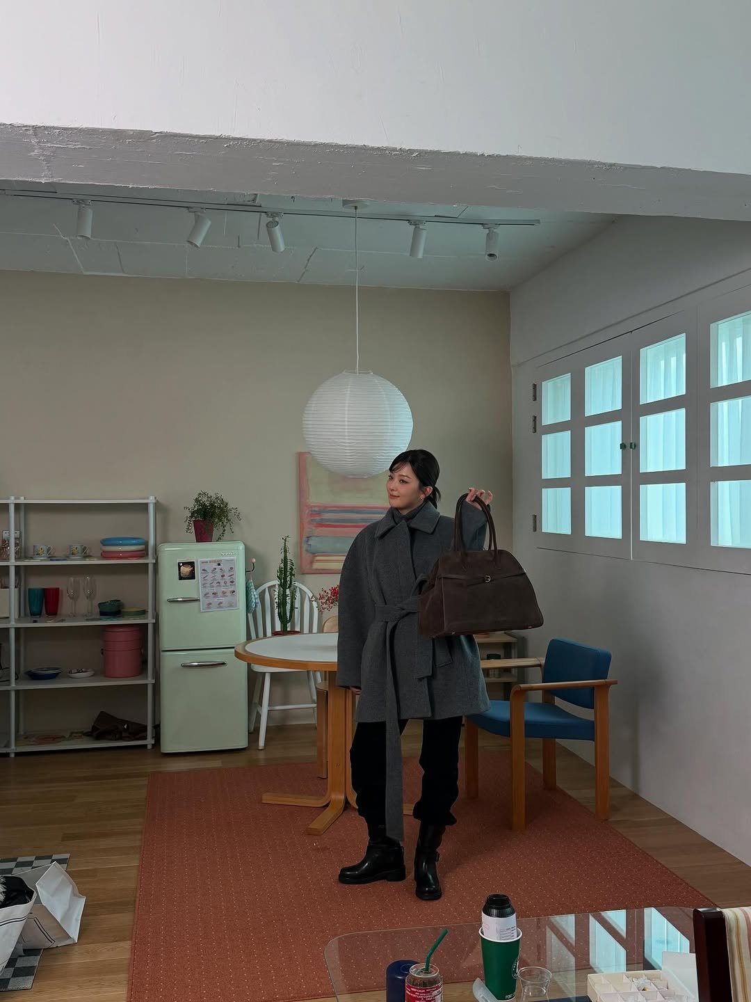 Photo by 슬기 Seulgi on November 09, 2025. May be an image of duffle coat and text.