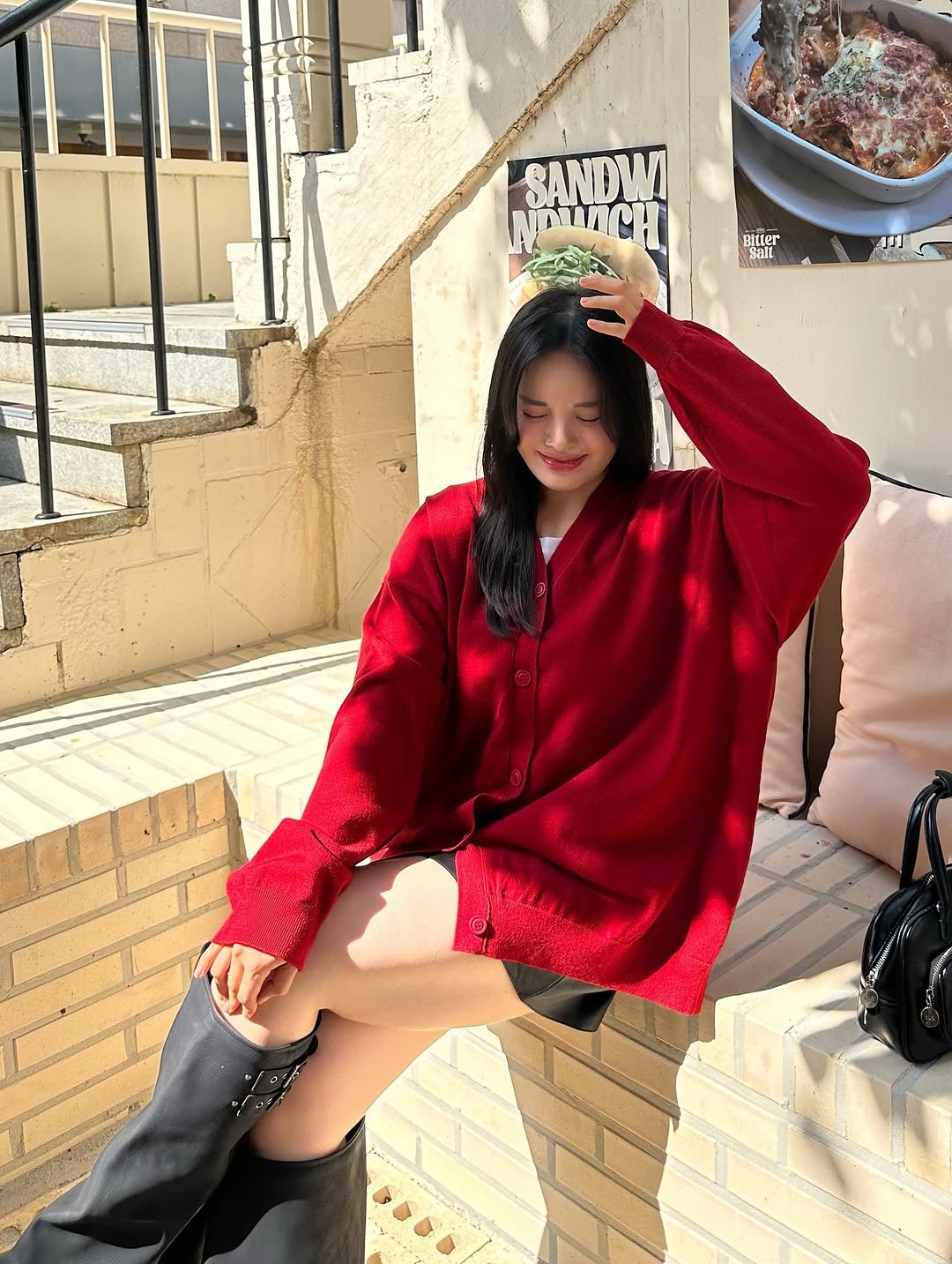 Photo shared by 물결 Mulgyul on September 14, 2025 tagging @dangdanggirl_official. May be an image of 1 person, tunic, cardigan, turtleneck and text.
