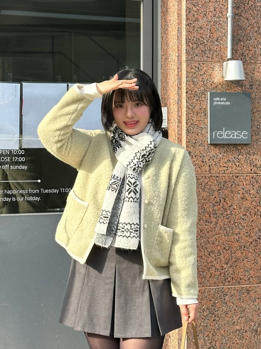 Photo shared by 물결 Mulgyul on December 15, 2025 tagging @musepl_official. May be an image of duffle coat, overcoat, turtleneck, parka, beret and text.