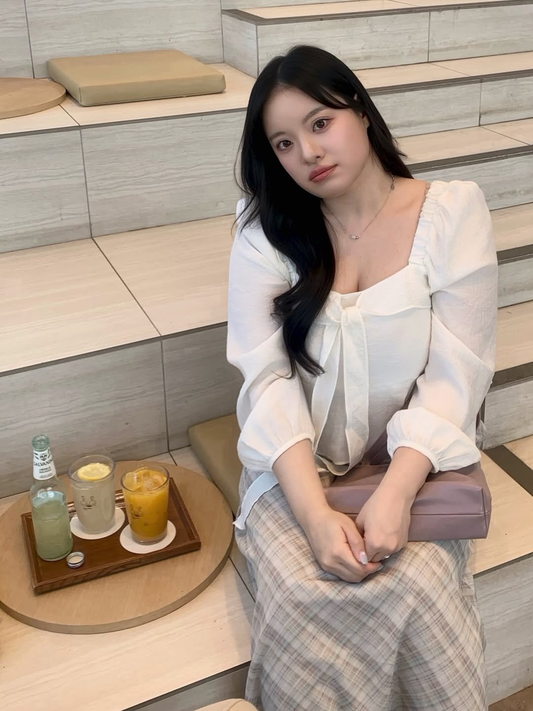 Photo by 물결 Mulgyul on April 10, 2026. May be an image of one or more people, hair, juice, cornflower and text.