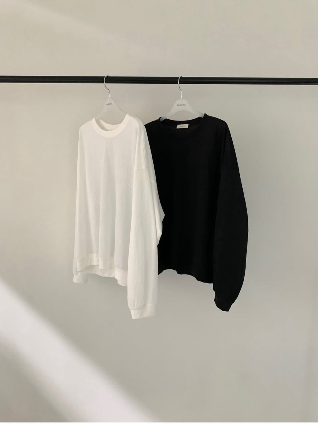 Photo by 남윤희 on March 26, 2026. May be an image of clothes hanger, top, sweatshirt and text.