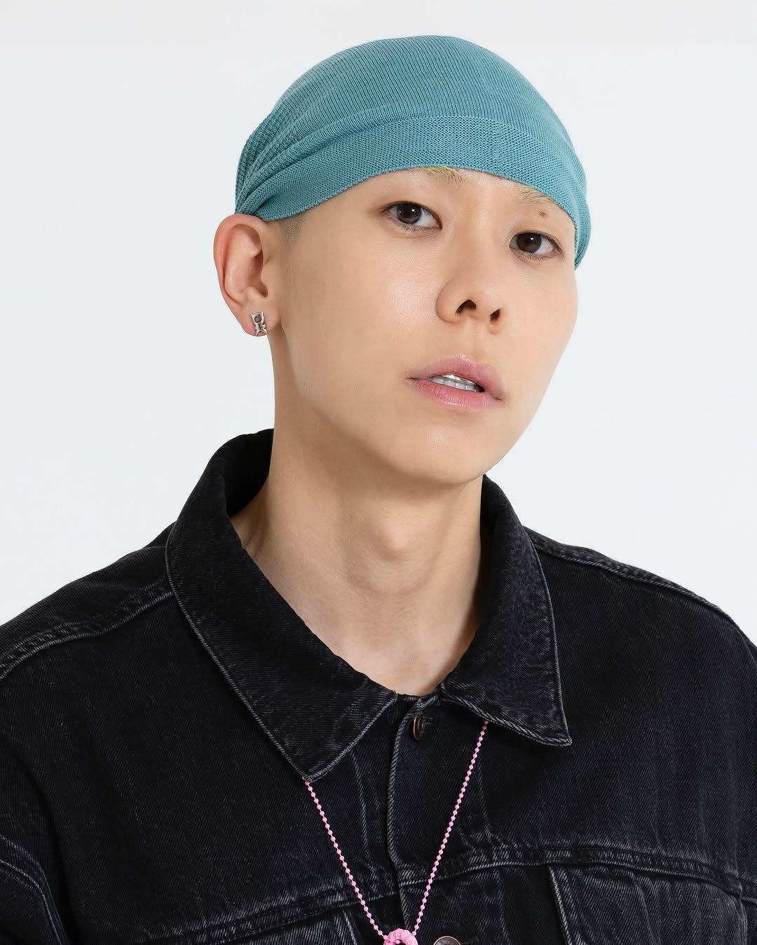 Photo shared by 에이치아이피 HIP on November 10, 2025 tagging @satgotloco. May be an image of one or more people, makeup, hat, beret, bandanna, turban, bolo tie and text.