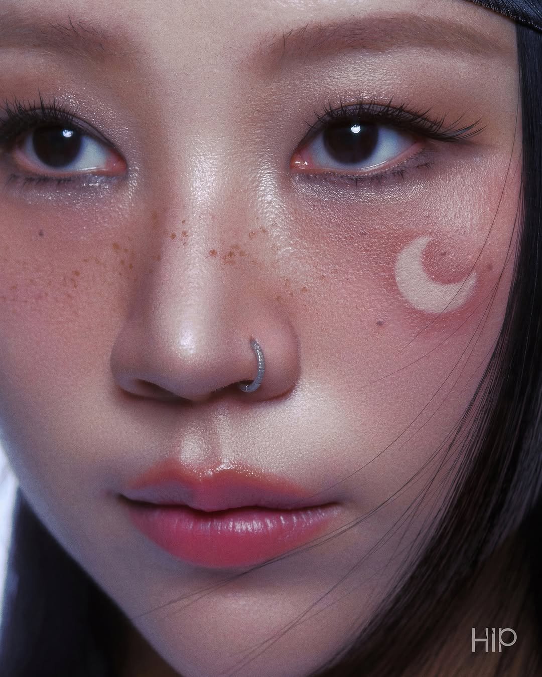 Photo shared by 에이치아이피 HIP on November 07, 2025 tagging @ooonthedal. May be a closeup of one or more people, makeup, eyeliner and text.