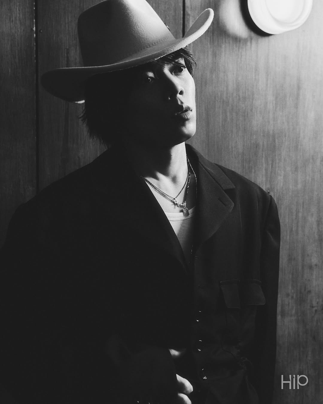 Photo shared by 에이치아이피 HIP on December 22, 2025 tagging @o3ohn. May be a black-and-white image of hat, bolo tie, bowler hat and text.