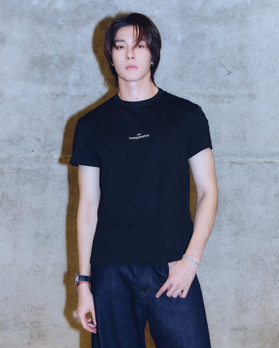 Photo shared by 「 Nani 」 on February 08, 2026 tagging @maisonmargiela. May be an image of top, sweatpants, sportswear and text.