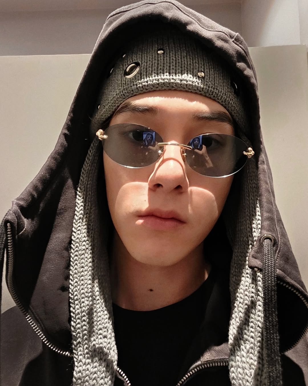 Photo by 「 Nani 」 on November 09, 2025. May be a selfie of one or more people, bangs, eyeglasses, bolo tie, top and text.