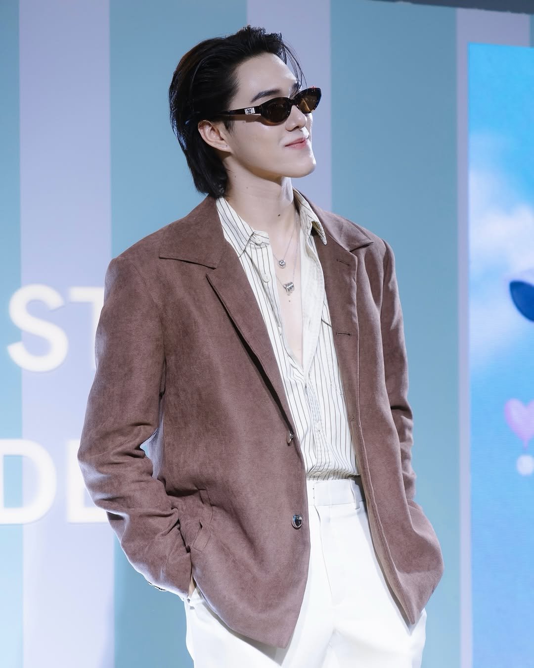 Photo shared by 「 Nani 」 on March 26, 2026 tagging @lenskartth. May be an image of overcoat, eyewear, blazer, suit and text.