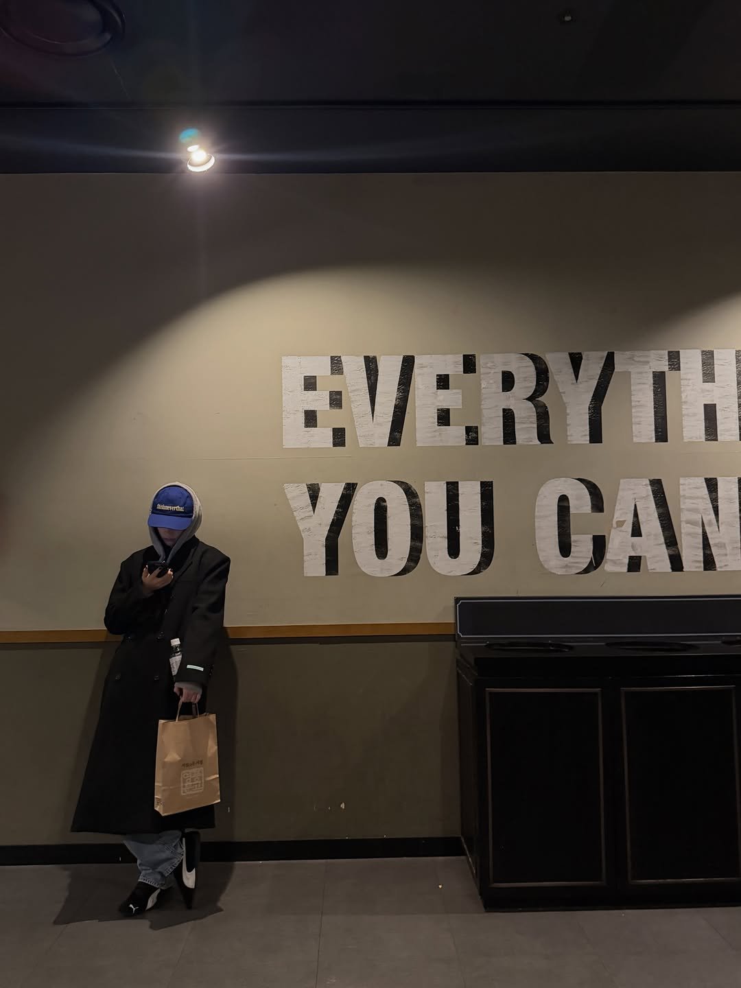 Photo by 휴닝바히에 HUENING BAHIYYIH on November 30, 2025. May be an image of duffle coat, overcoat, cornflower and text that says 'EVERYTH ITH YOU CAN'.