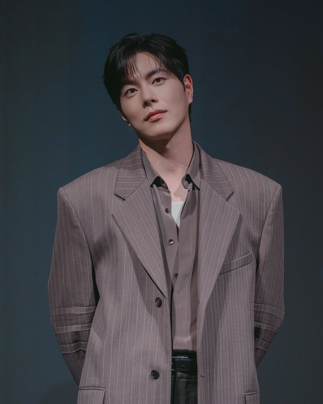 Photo shared by 홍종현 on November 02, 2025 tagging @tving.official. May be an image of bolo tie and text.