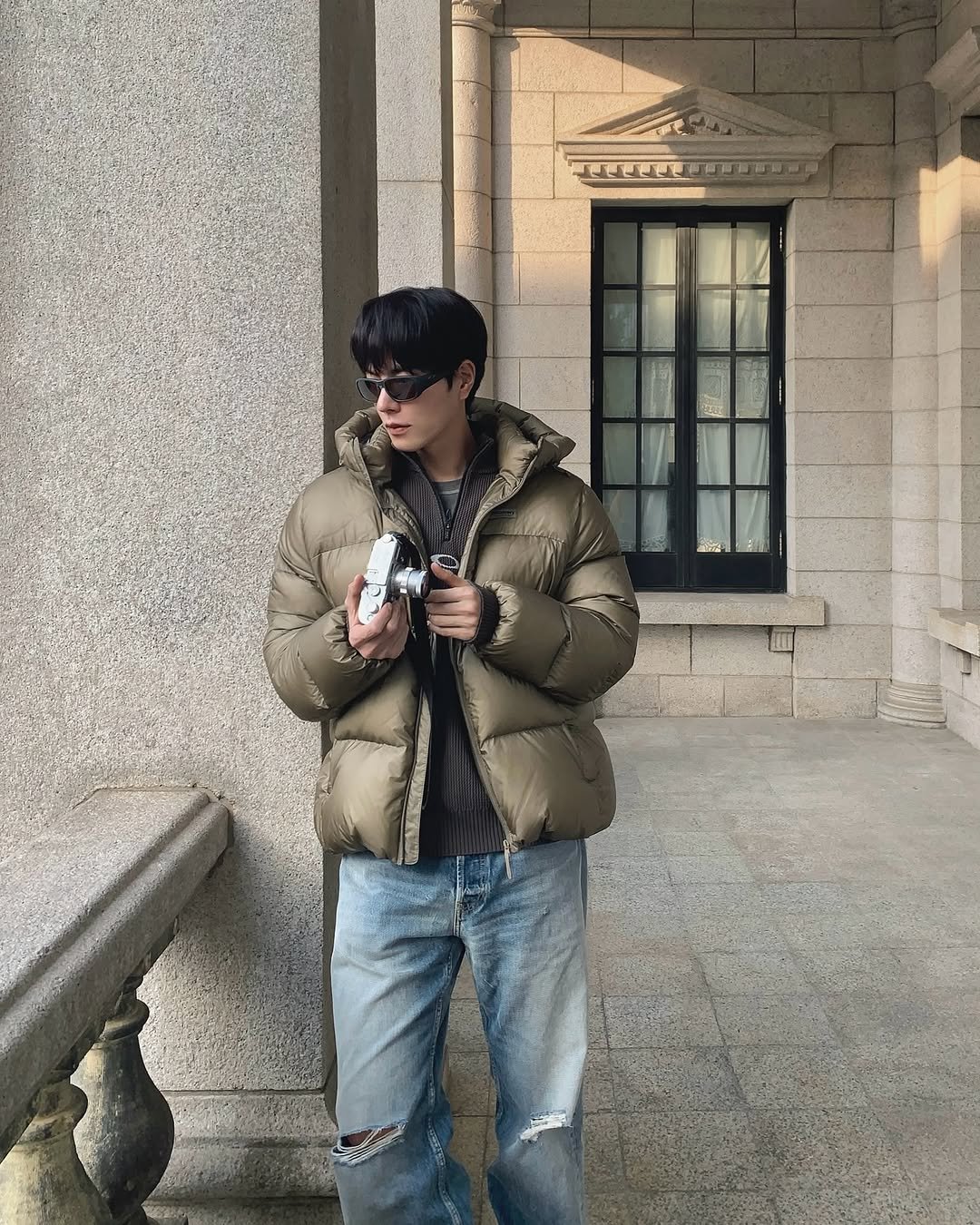 Photo shared by 홍종현 on November 11, 2025 tagging @discoveryexpedition_kr. May be an image of overcoat, goosedown coat, duffle coat, flight jacket, parka and text.