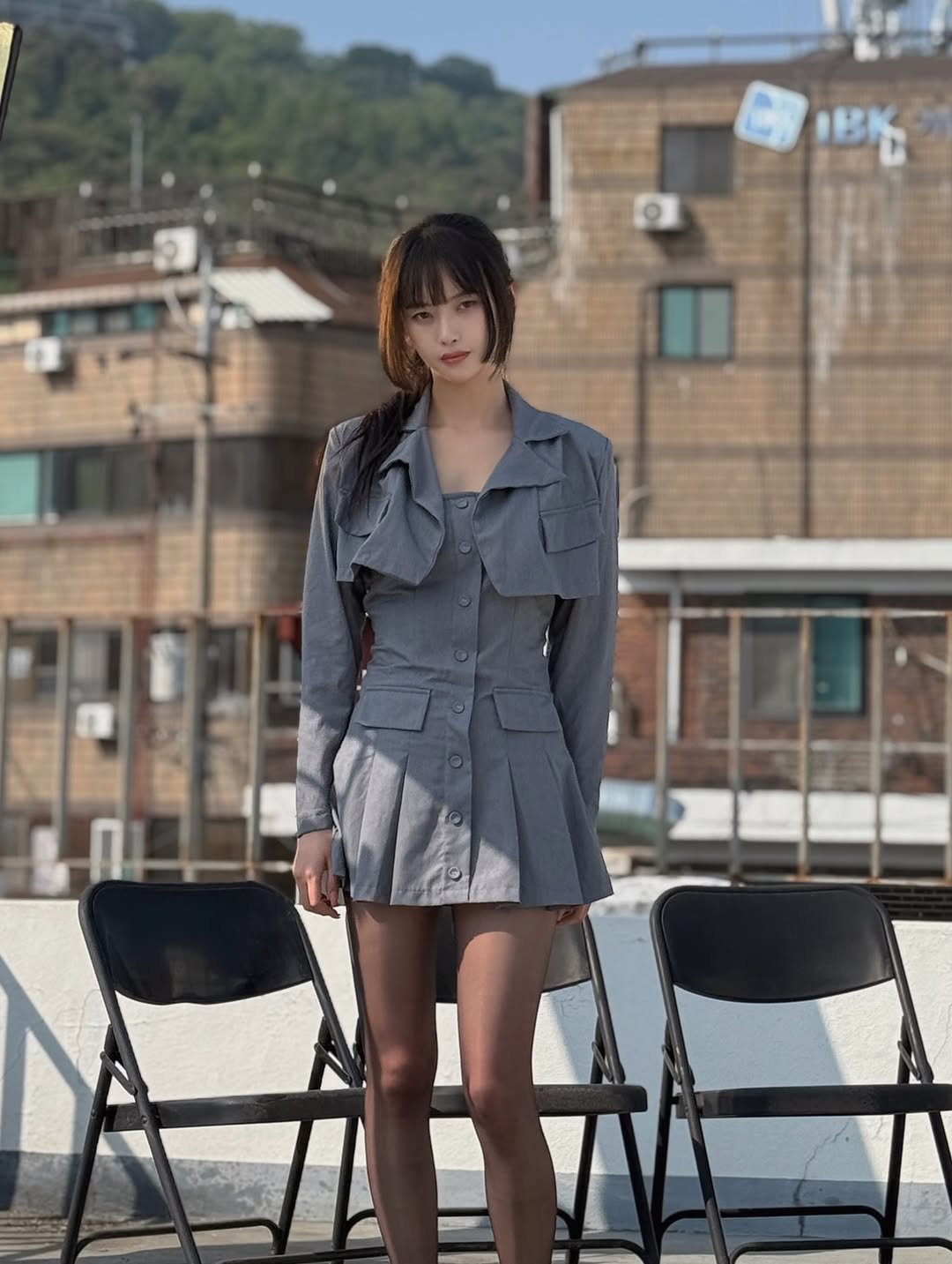 Photo by 고말숙 on November 23, 2025. May be an image of duffle coat, blazer, jacket, miniskirt, dress and text.