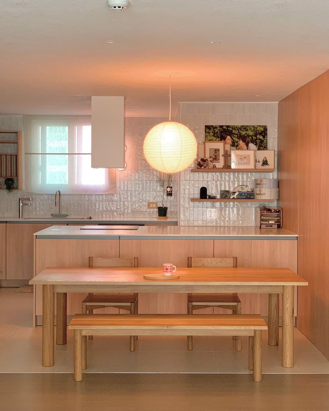 Photo shared by HOHA 호하 (前.살림취향집) on December 23, 2025 tagging @hoha.kr. May be an image of lighting, table, dining table, kitchen table, indoors, kitchen and text.