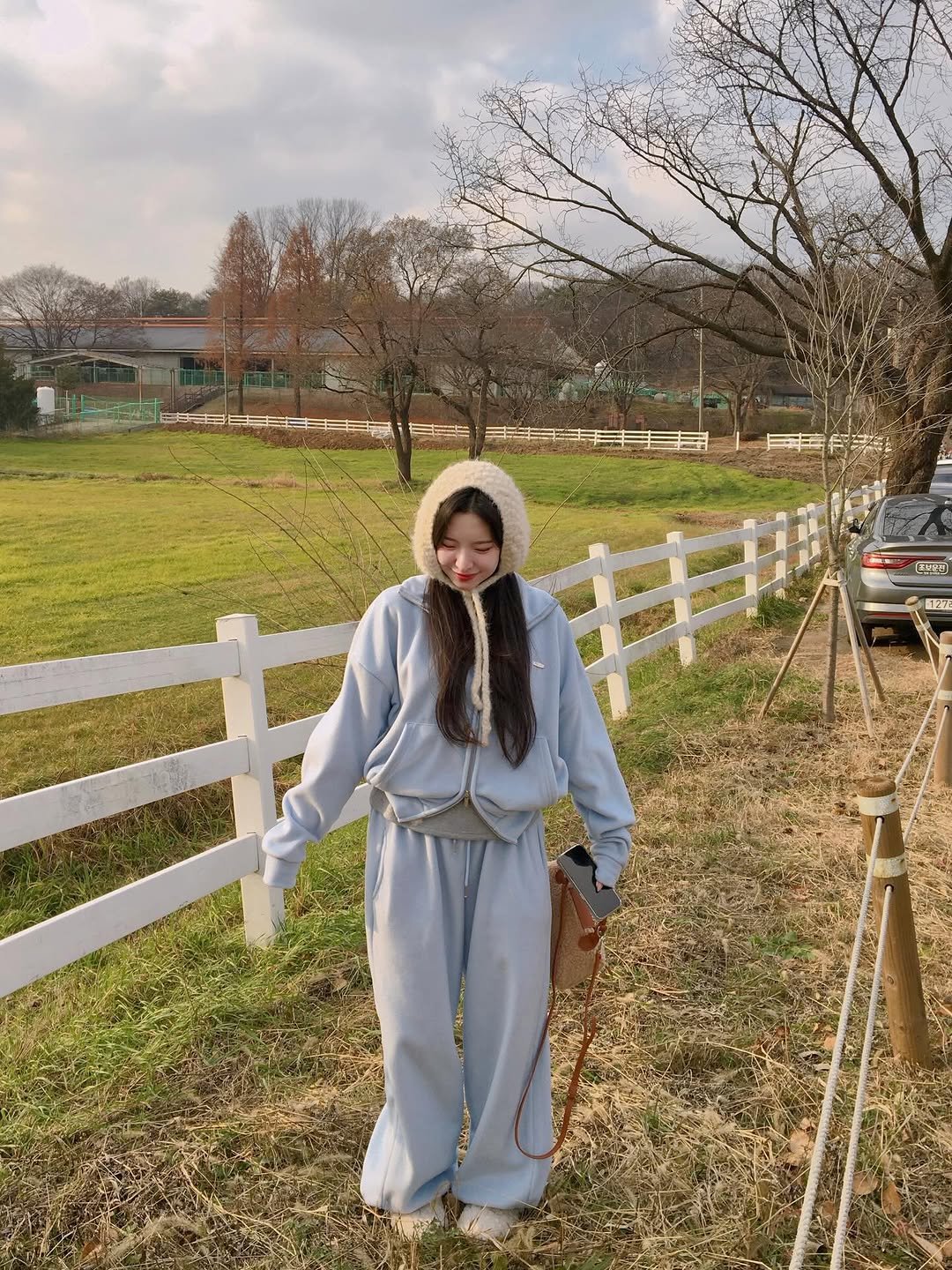 Photo by (주)홀리 on December 01, 2025. May be an image of sleepwear, robe, bath robe, sweatsuit, parka and text.