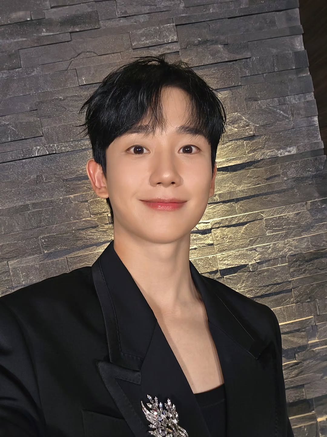 Photo by 정해인 on December 14, 2025. May be an image of one or more people, bolo tie and text.