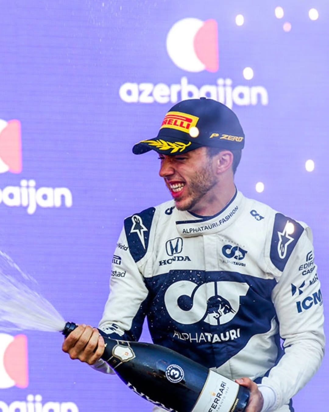 Photo by Honda Racing F1 in Baku City Circuit with @pierregasly. May be an image of racing vehicles, helmet and text that says 'azerb azerbaijan aijan ELLI PZERD ZERD aijan ALPHATAURL.FADMION FASHION Ccy ALPHAT D stad TAUDI EDIF CASI มี MIN ICM 五 ALPHATAURI ERRARI ERRARI'.