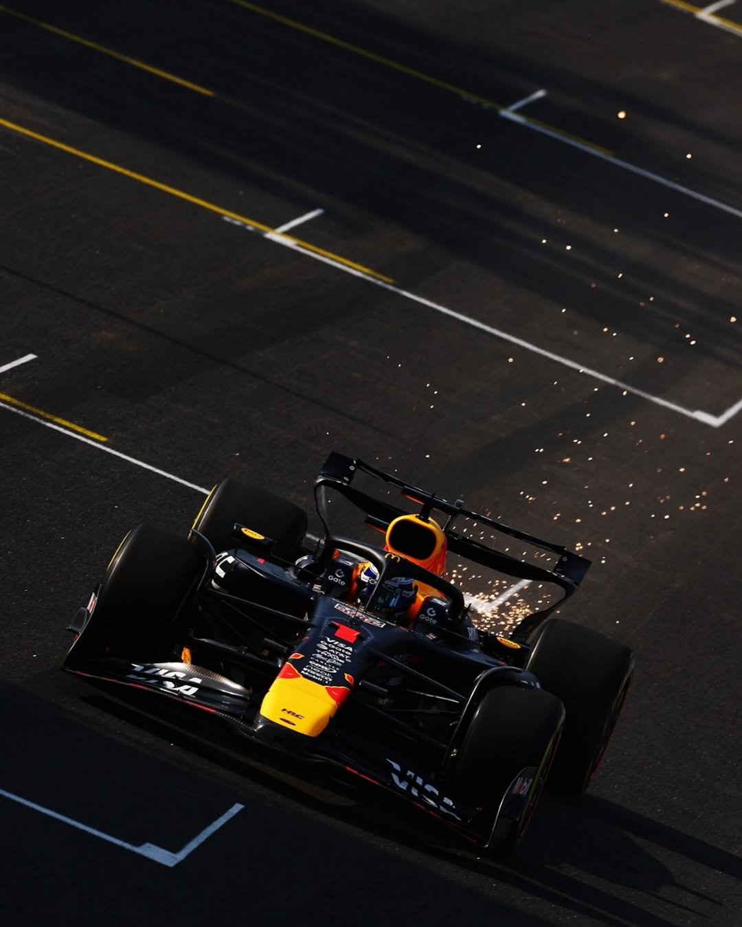 Photo shared by Honda Racing F1 on November 07, 2025 tagging @maxverstappen1. May be an image of racing vehicles, race car and text.