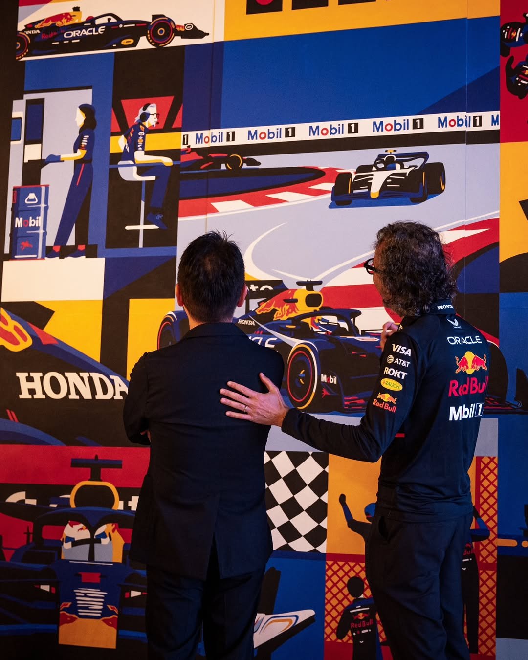 Photo shared by Honda Racing F1 on December 07, 2025 tagging @redbullracing, and @mobil1motorsport. May be an image of racing vehicles and text that says 'ORACLE Mobil1 Mobil 1 Mobil Mobil1 1 Mobil1 1 Mobil1 M Mobil bil NTA ር HON HONDA ORACLE bl VISA 9 AT&T ROKT HAAUCH RedBul RedBu MbilT'.