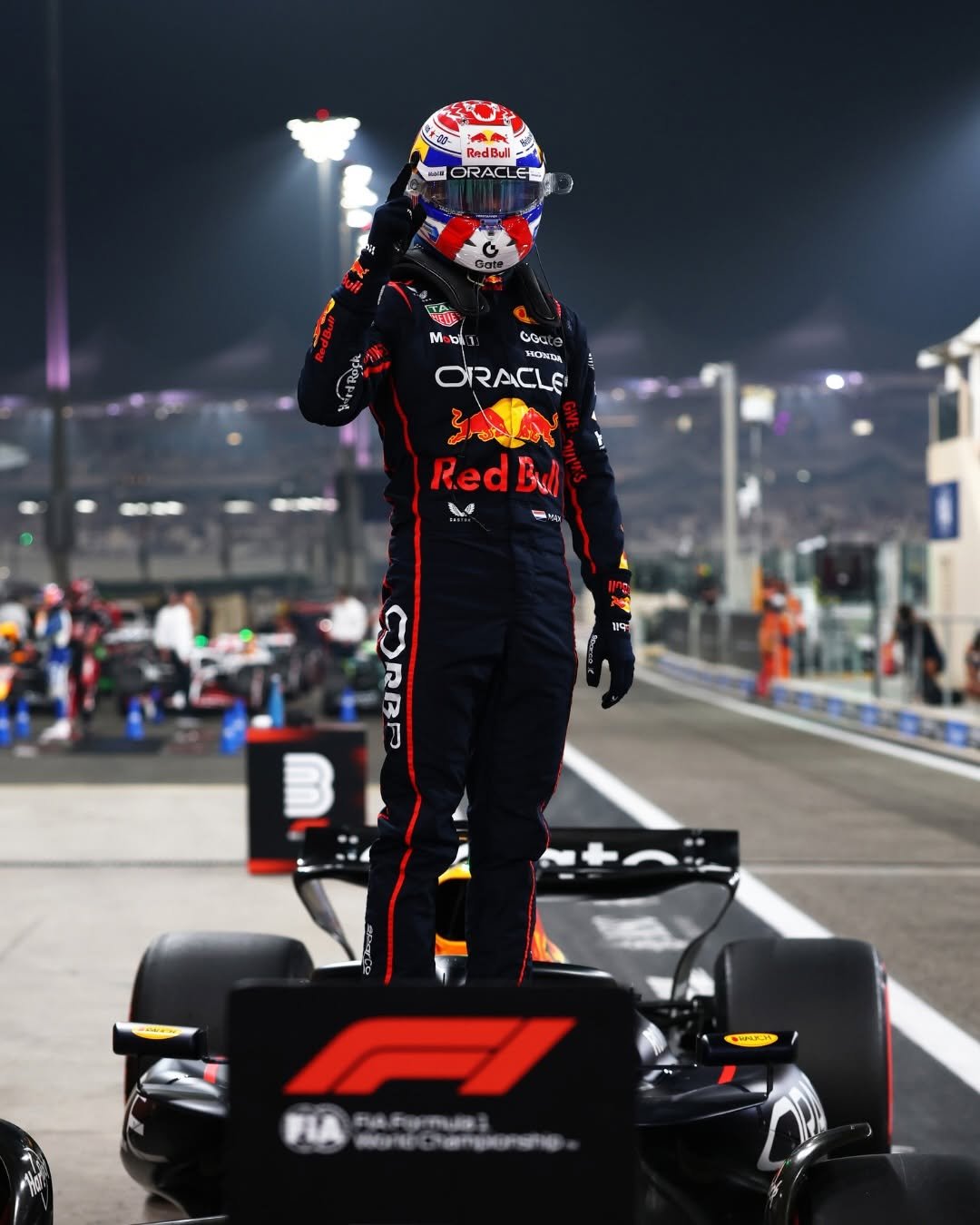 Photo shared by Honda Racing F1 on December 06, 2025 tagging @maxverstappen1, @redbullracing, and @f1. May be an image of racing vehicles, race car, helmet and text.