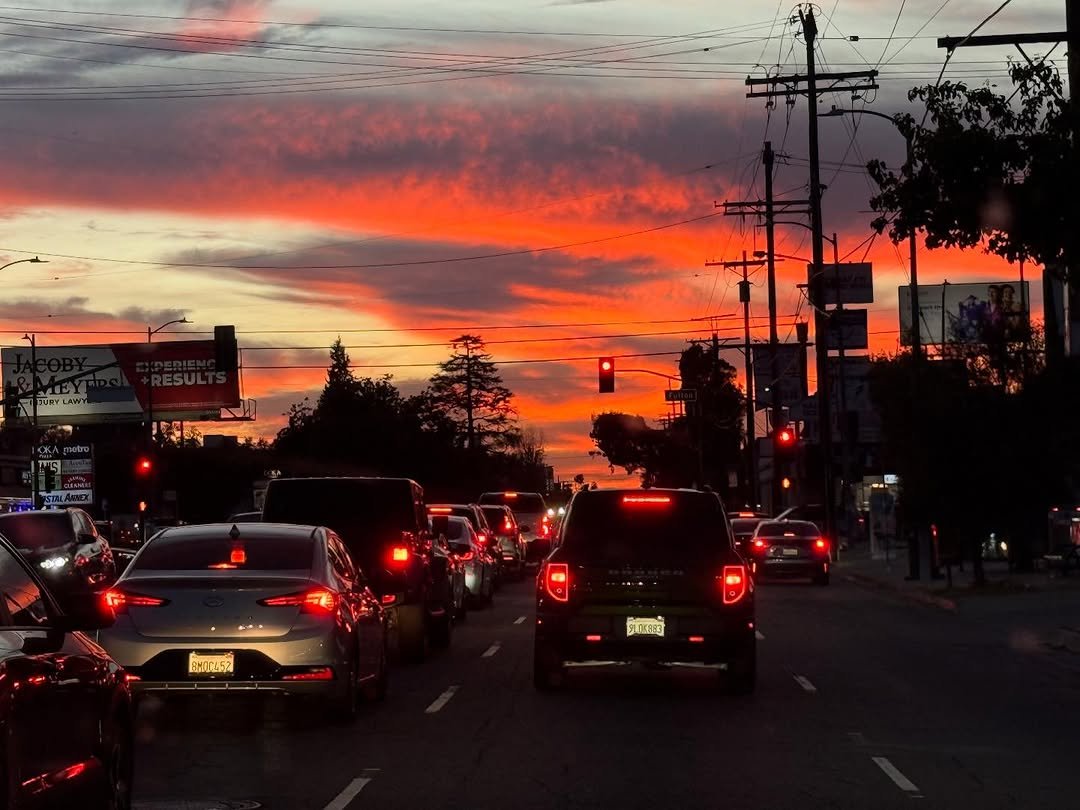 Photo by LANA DEL REY on March 13, 2026. May be an image of road, street, twilight, sky, telephone pole and text.