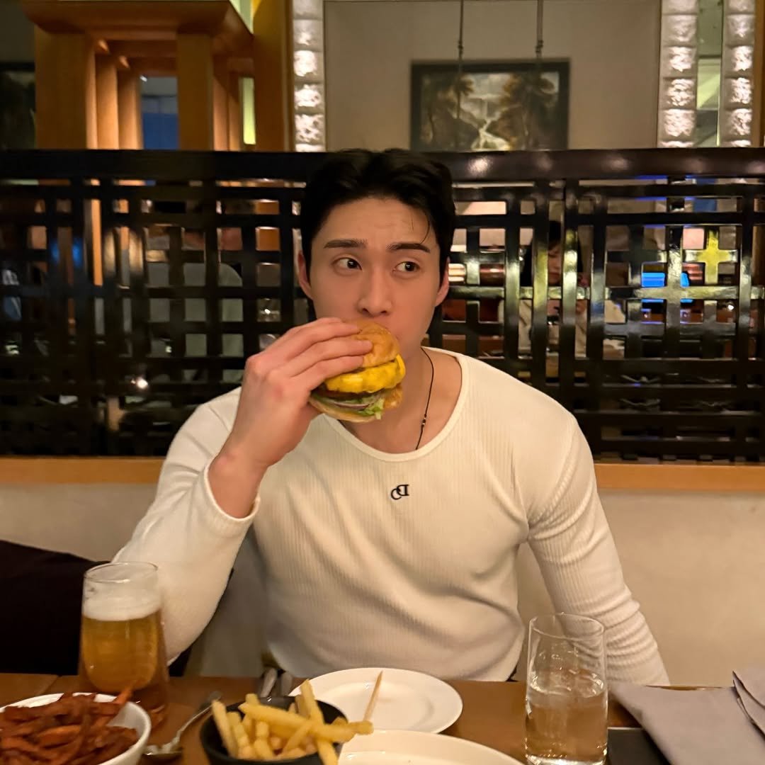 Photo shared by 홍버즈 on February 26, 2026 tagging @chuckdo_. May be an image of egg yolk, burger, french fries and text.