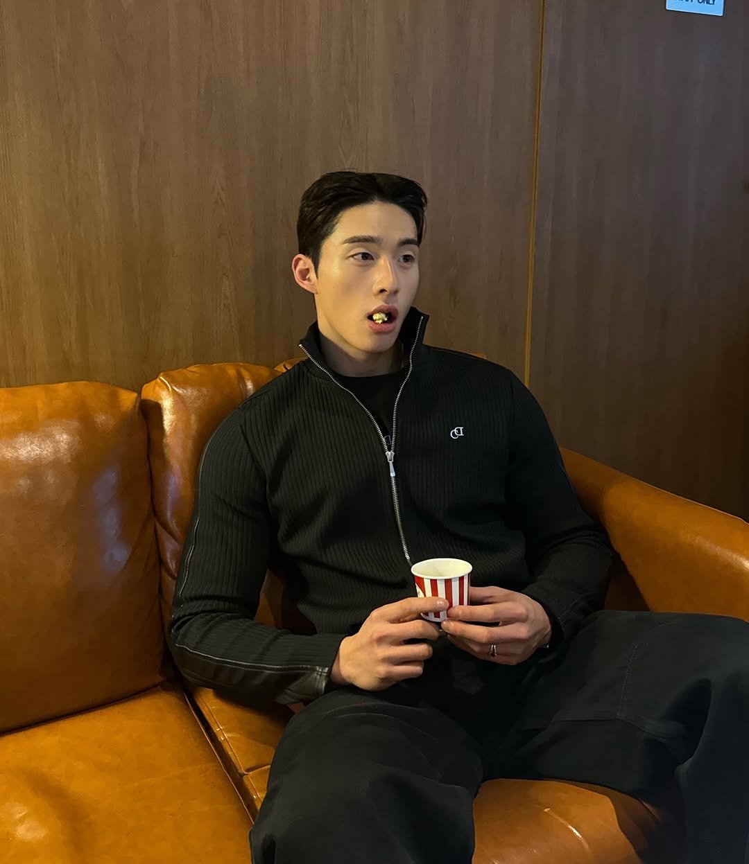 Photo shared by 홍버즈 on February 21, 2026 tagging @chuckdo_. May be an image of one or more people, drink, cigarette and text.