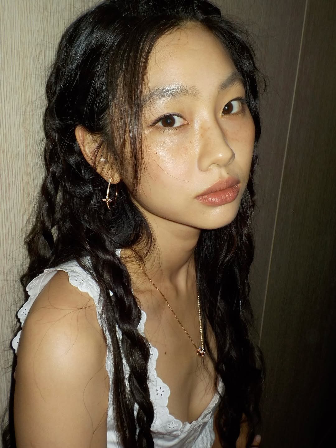 Photo shared by Hoyeon on October 01, 2025 tagging @louisvuitton, @nicolasghesquiere, @hh3116, and @leeseonyeong__. May be an image of one or more people, braids, makeup, baby's-breath and text.