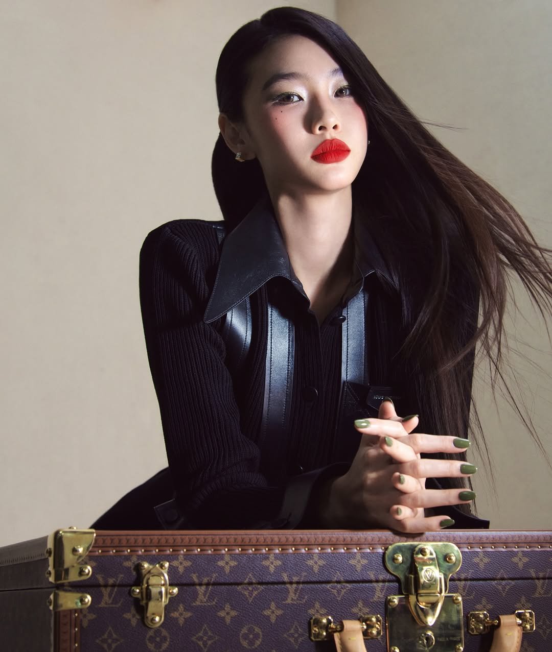 Photo shared by Hoyeon on February 19, 2026 tagging @wkorea, @louisvuitton, @yyoneeee, @___s_yeon, @keemsinae, @janghyeyeon_, and @li.m_official. May be an image of one or more people, makeup, hair, suitcase and text.