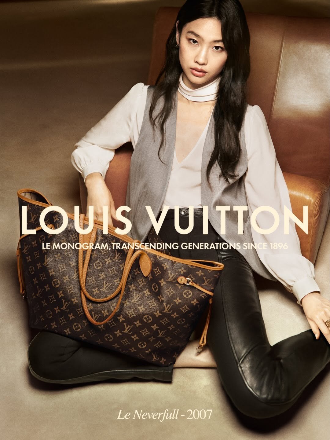 Photo shared by Louis Vuitton on February 13, 2026 tagging @hoooooyeony. May be an image of magazine, poster and purse.