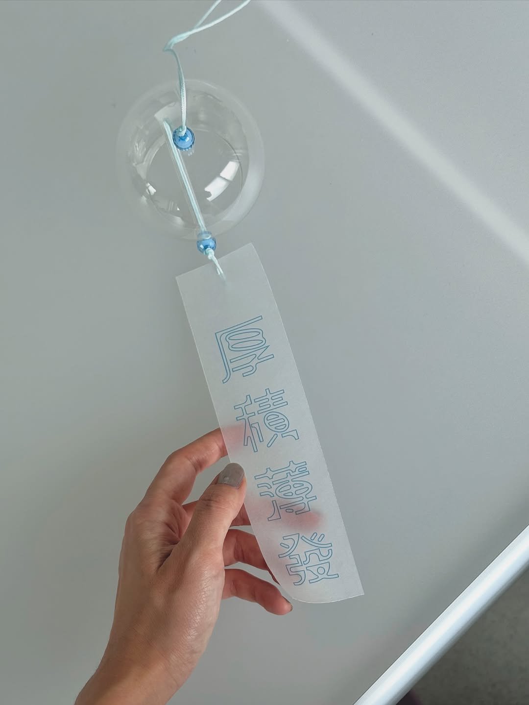 Photo by hooyounghoo on August 01, 2025. May be an image of wind chime, thermostat and text.