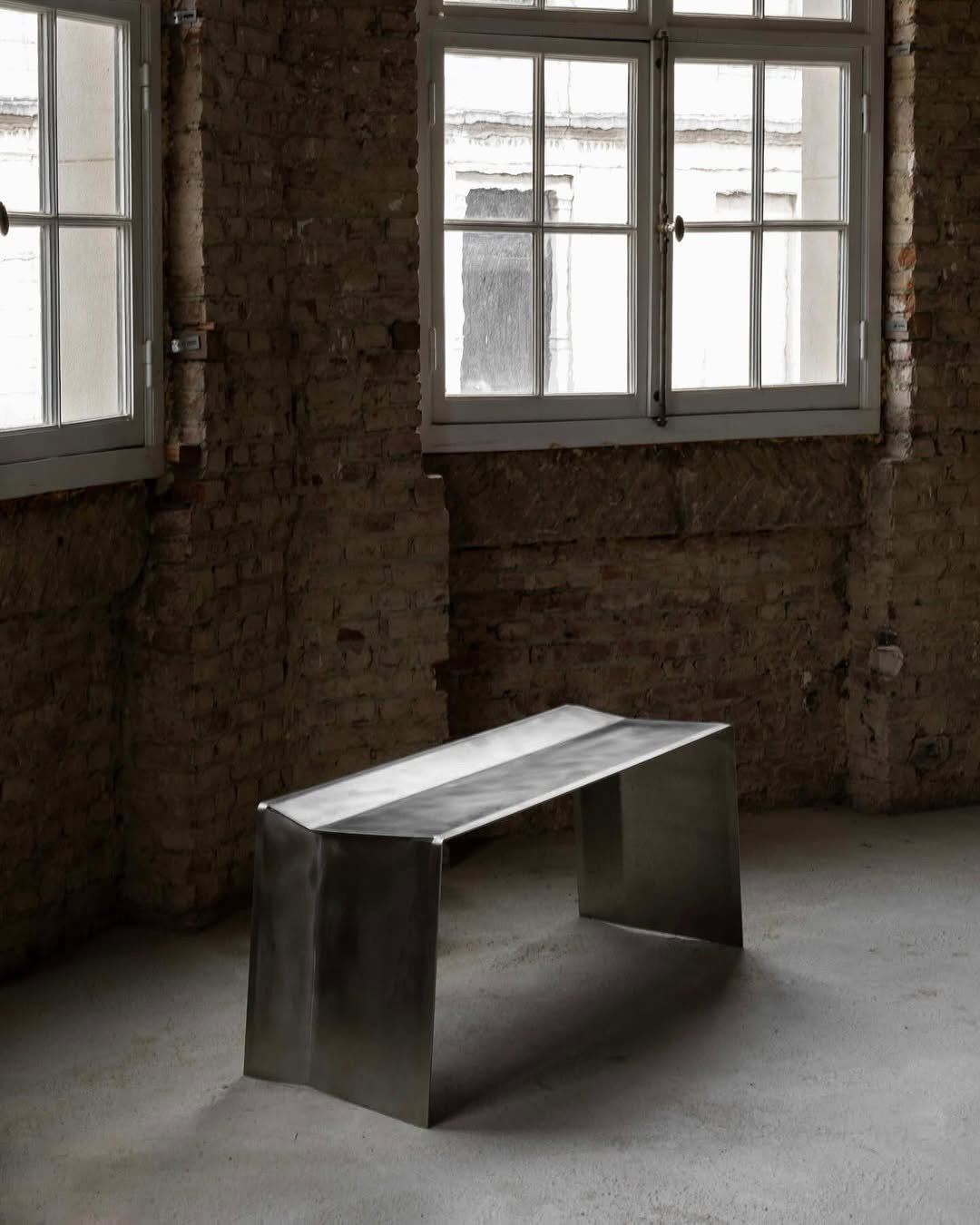 Photo shared by HPIX 에이치픽스 on August 07, 2025 tagging @paulcoenen. May be an image of table, bench, footstool and text.