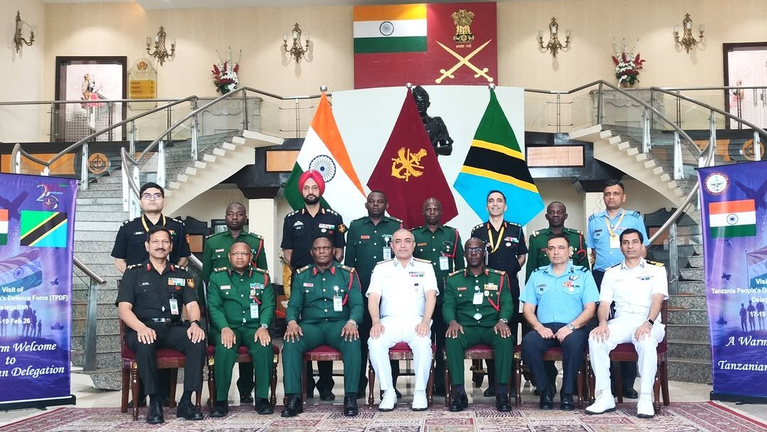 Photo by HQ IDS India Official Account on February 17, 2026. May be an image of one or more people, people standing, flag, office and text that says '抑焼 oKObl Visil of O Force TPDF) m m m Welcome to to n Delegation Tanzania A Warn ΑοΑαδύ Tanzania'.