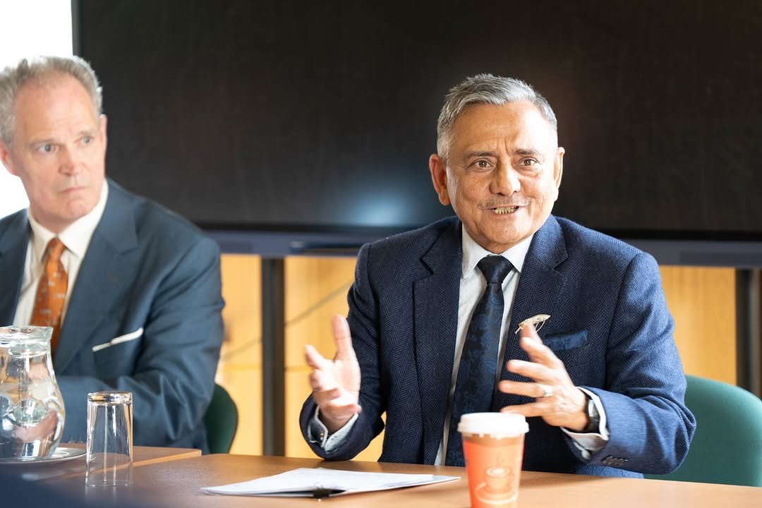 Photo by HQ IDS India Official Account on April 21, 2026. May be an image of suit, office and text.